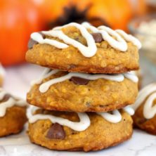 a stack of three pumpkin cookies