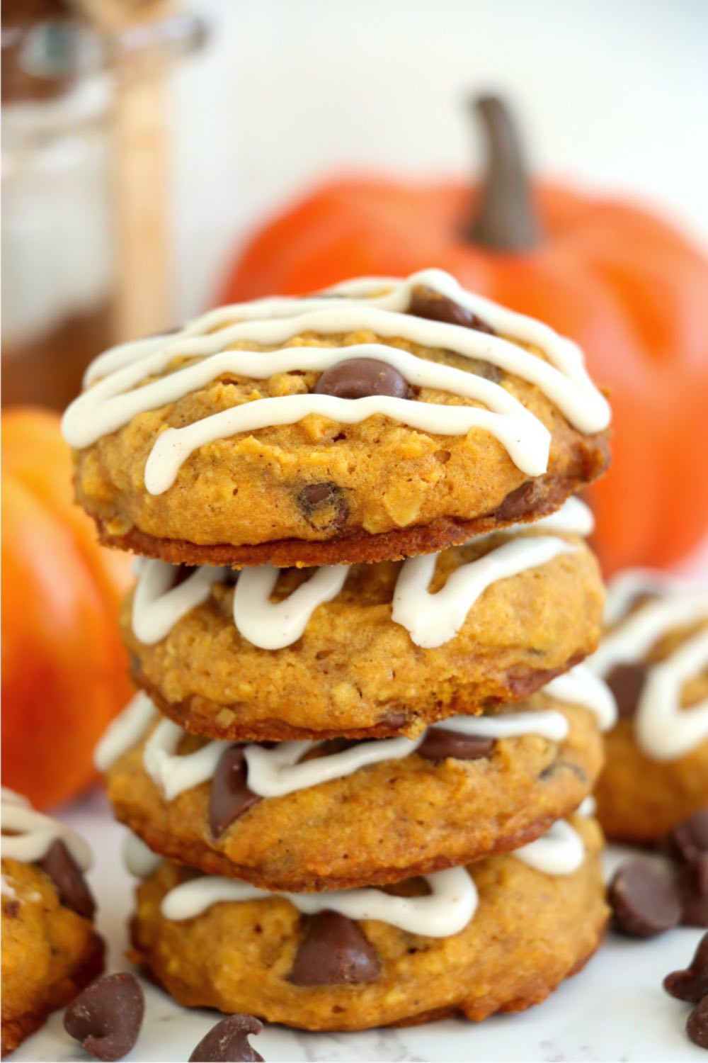 stack of four pumpkin chocolate chip cookies