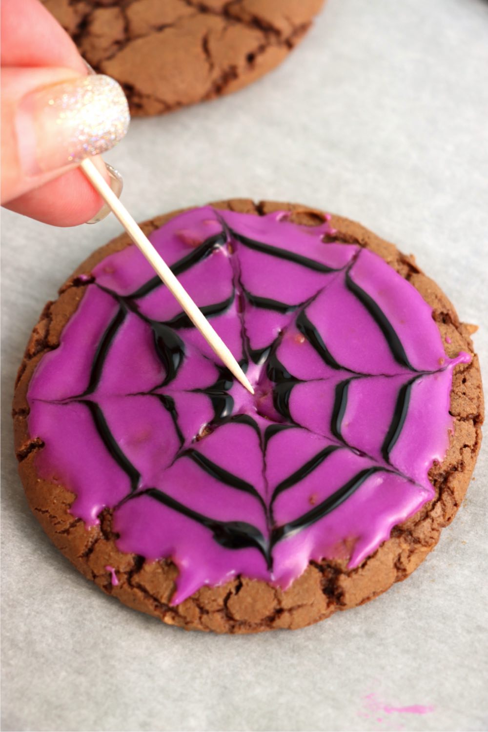 creating a spider web on a cookie