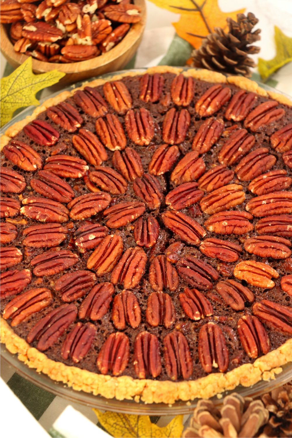overhead shot of decorative topping on pecan pie