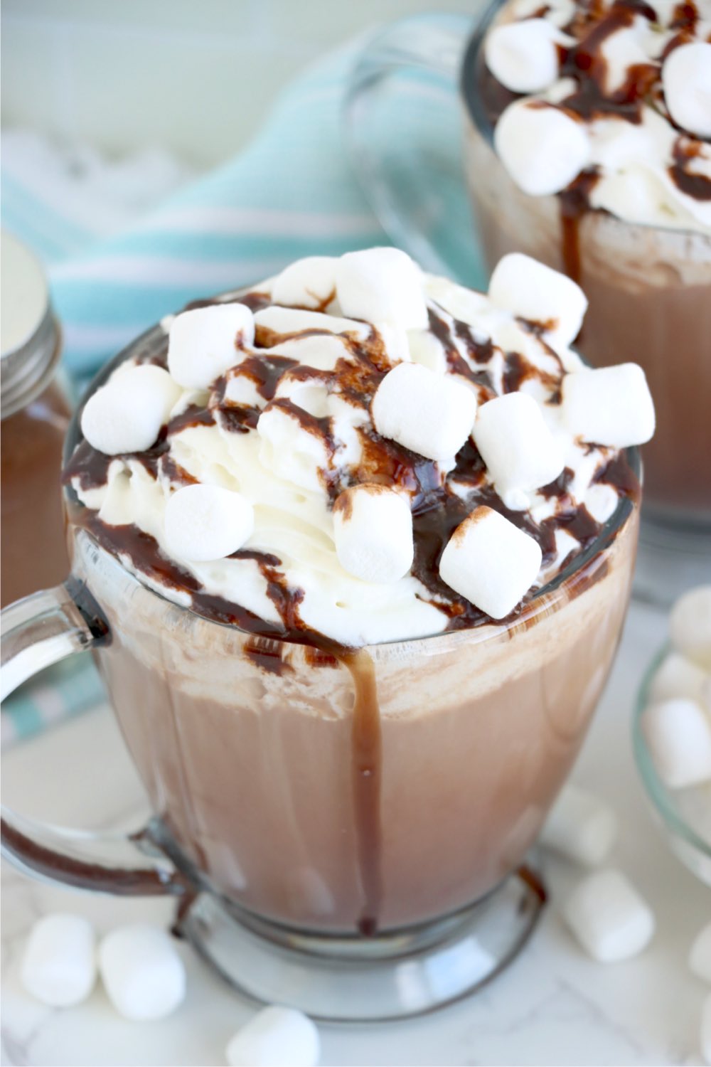 up close shot of hot cocoa in a mug with marshmallow topping