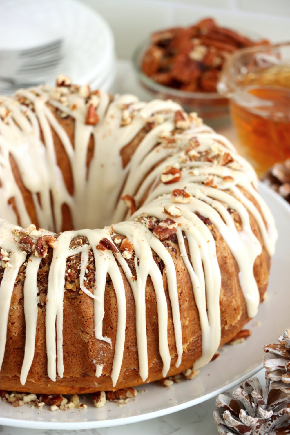 rum cake glazed with icing and pecans