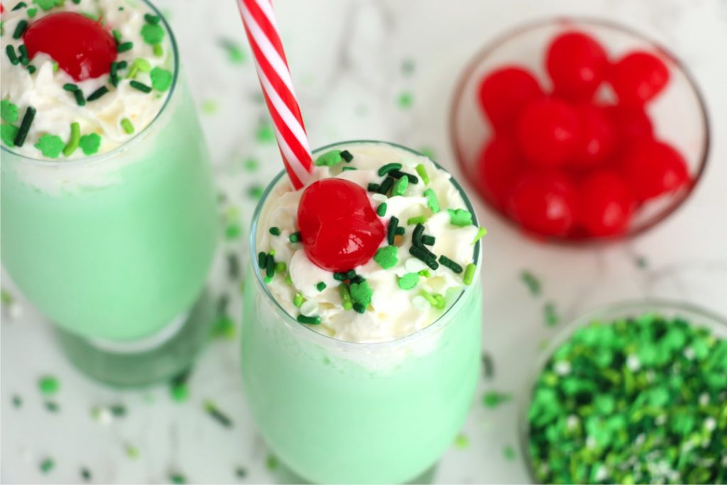 glasses filled with green colored milkshake