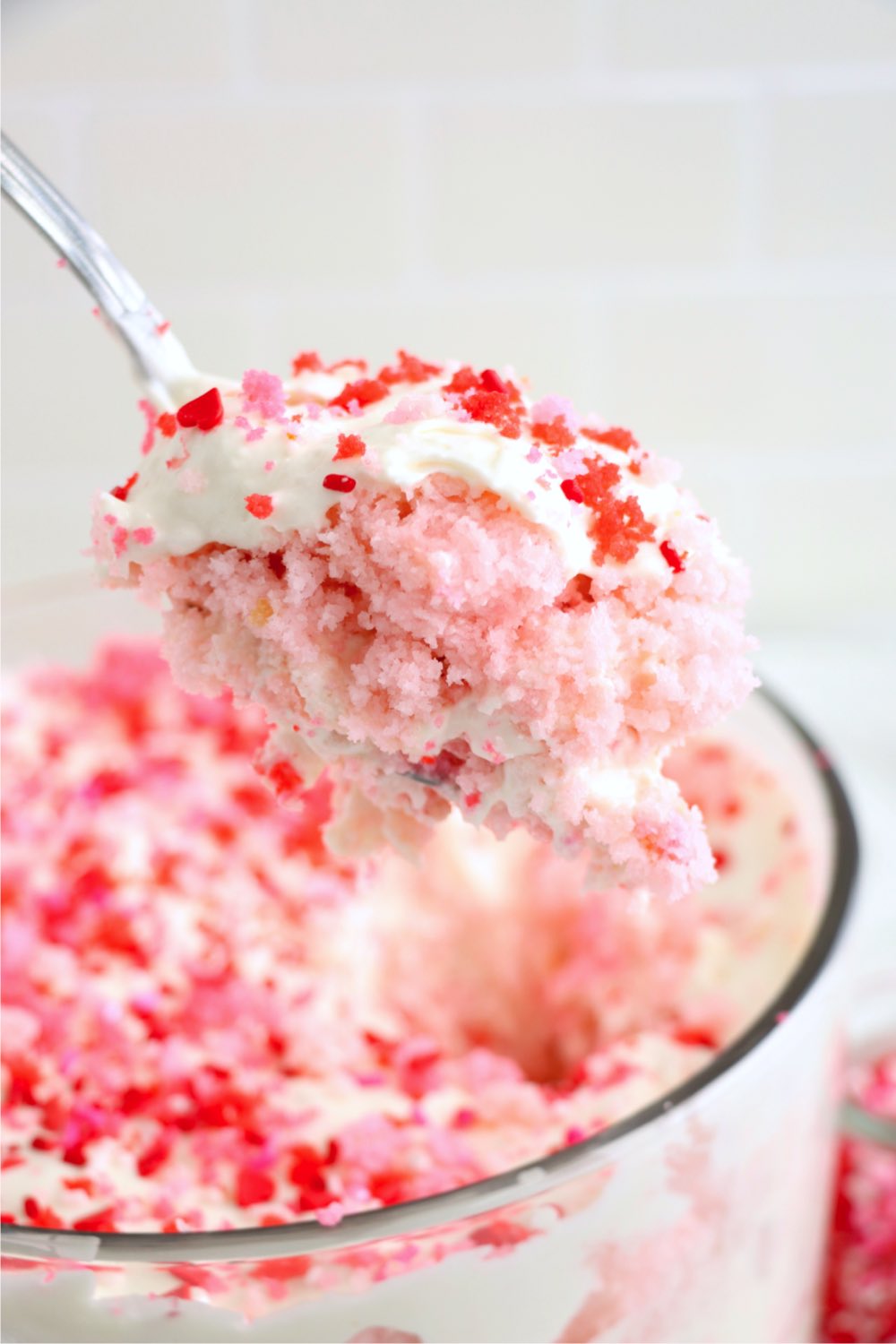 scoop of pink and red trifle dessert