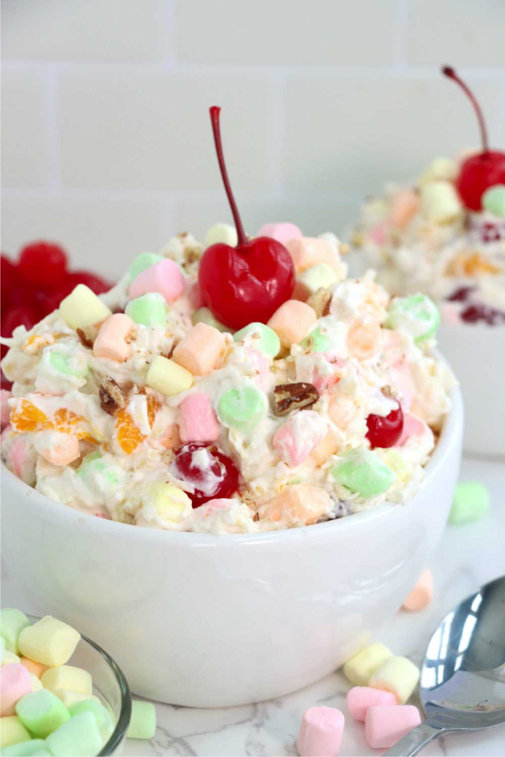 white bowl filled with ambrosia salad
