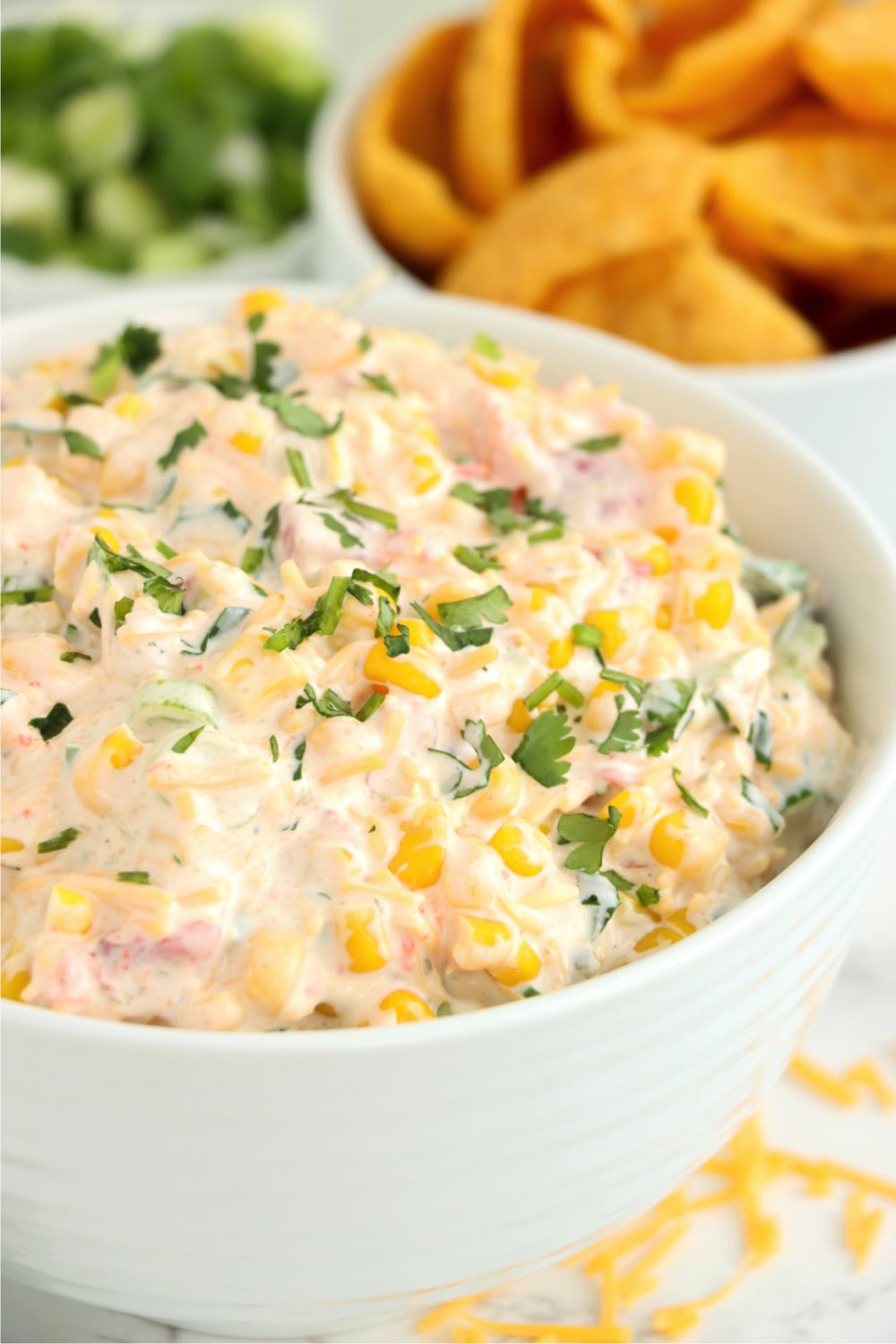 Bowl of corn dip made with Mexicorn and fresh ingredients