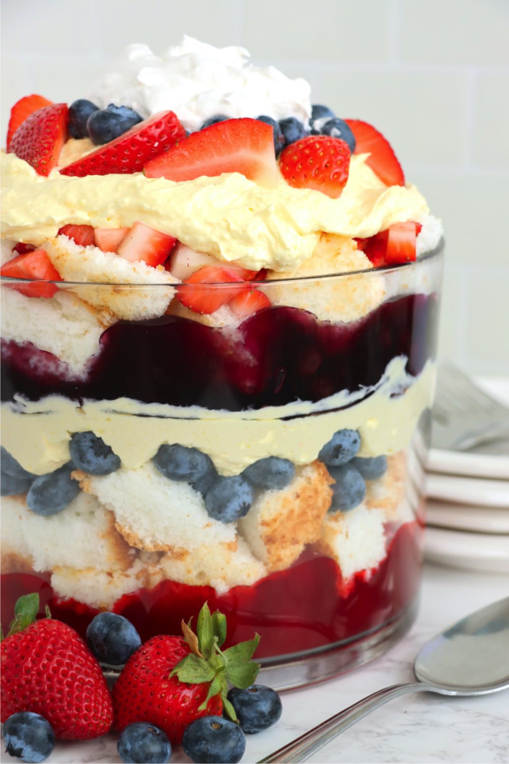 layers of cake, berries and pie filling