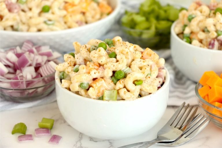 small bowl of macaroni salad with ham and peas