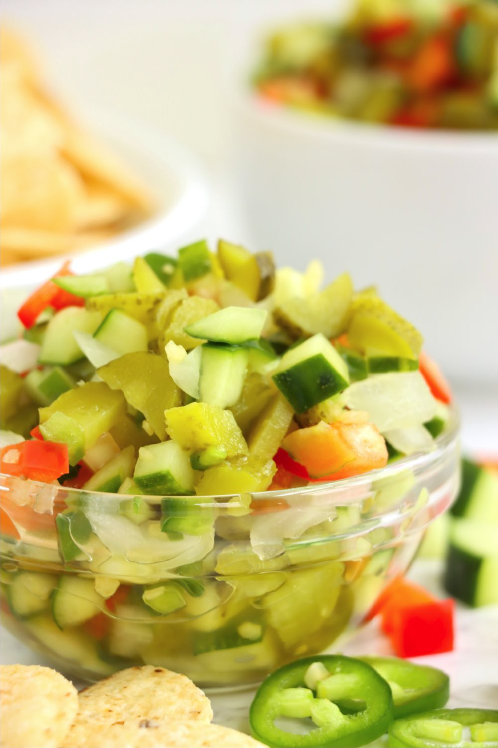 close up shot of a small glass bowl with diced fresh veggies
