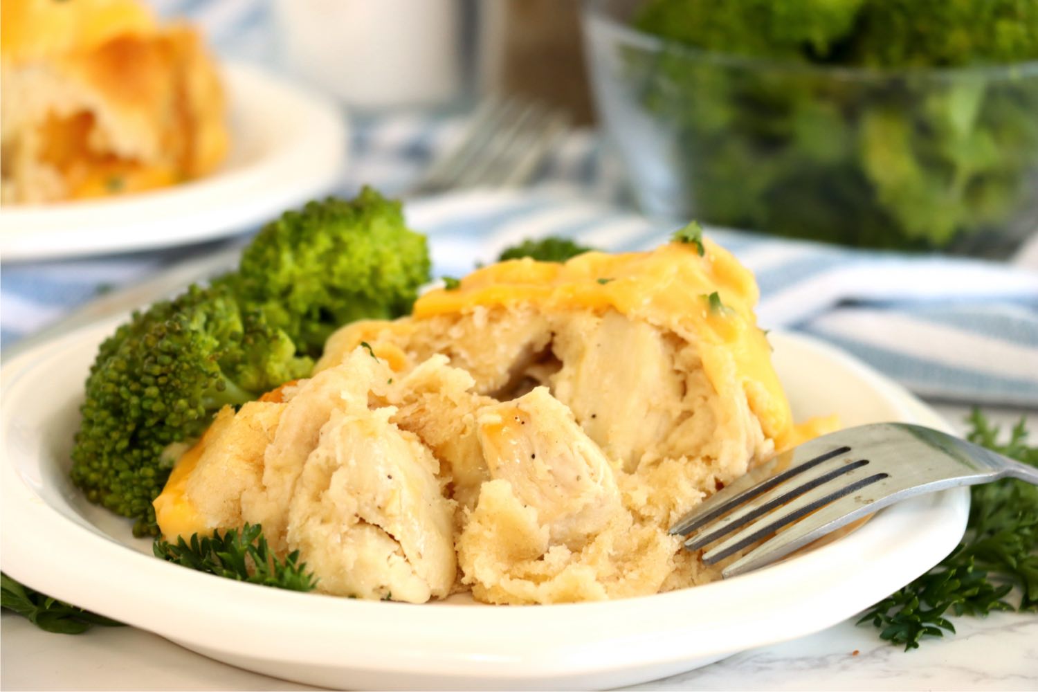crescent roll casserole and broccoli on a plate