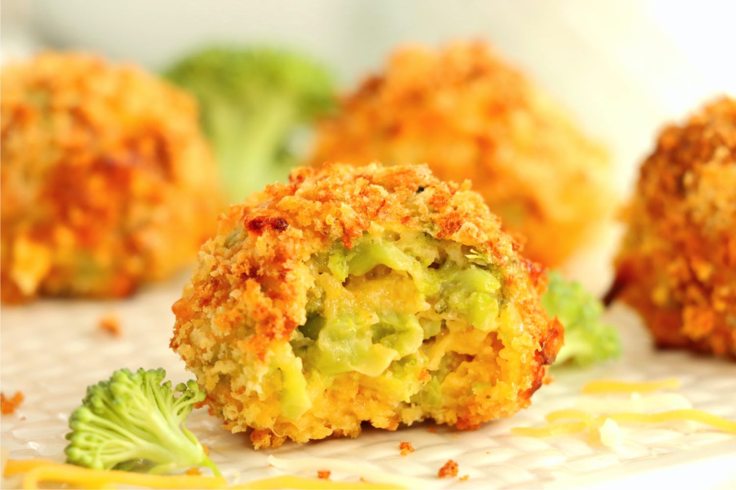 up close shot of the inside of a broccoli cheese ball