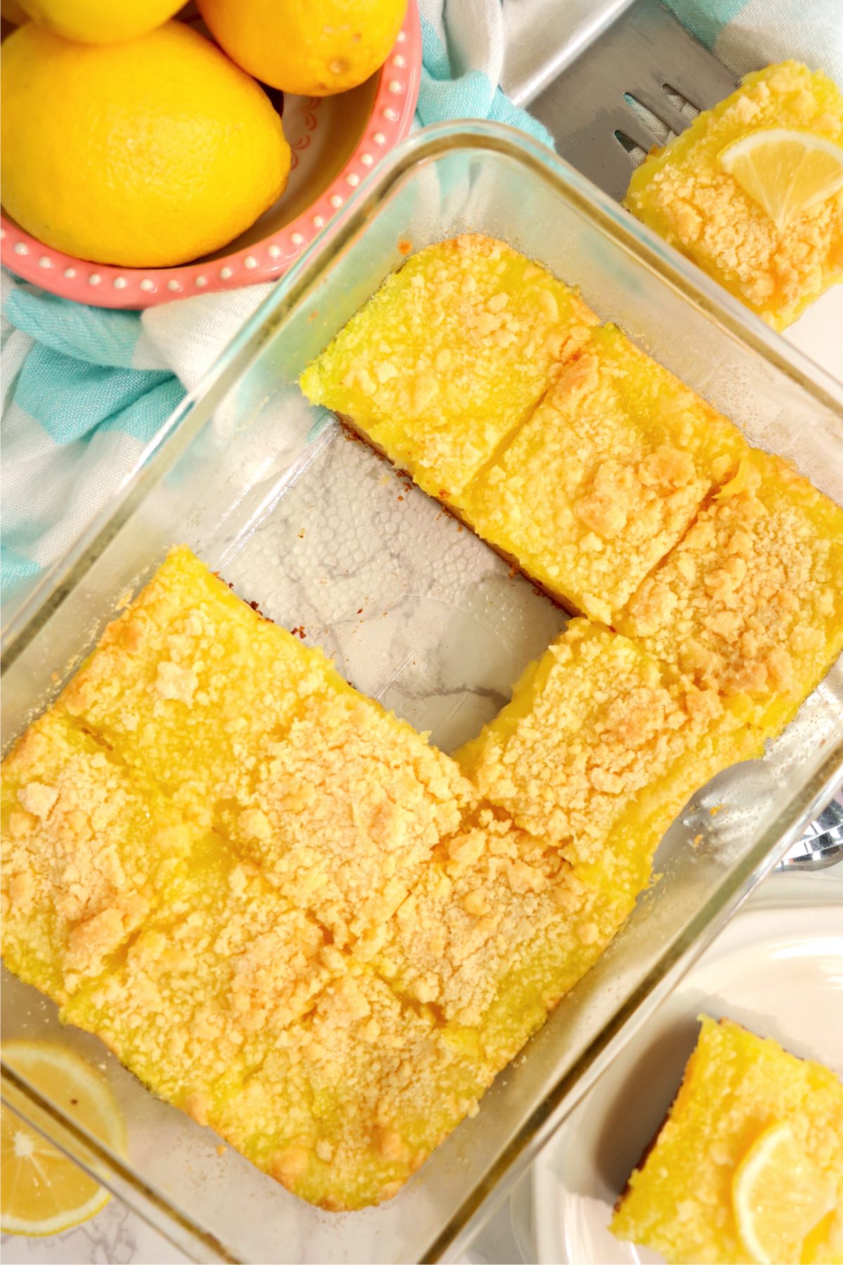 pan of lemon bars with a couple missing