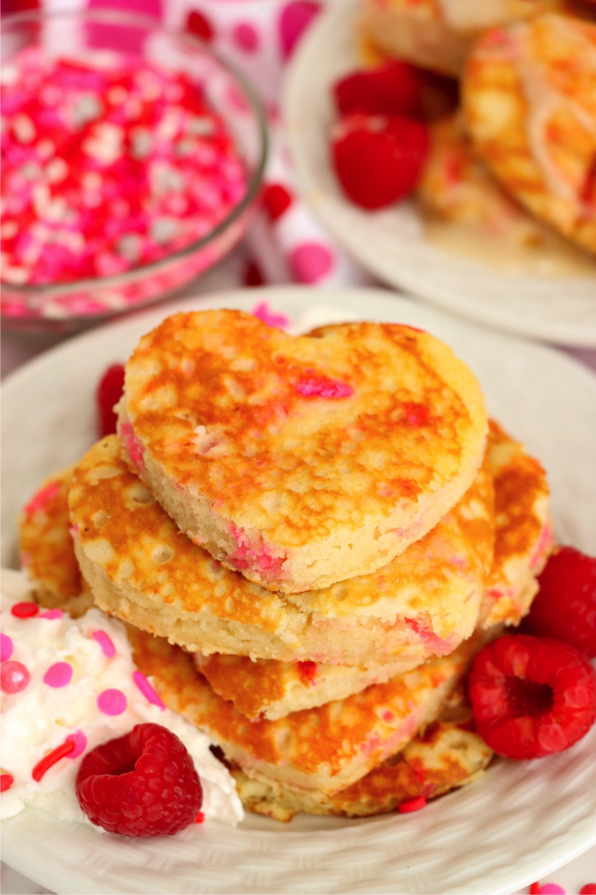 plate with a stack of heart-shaped pancakes