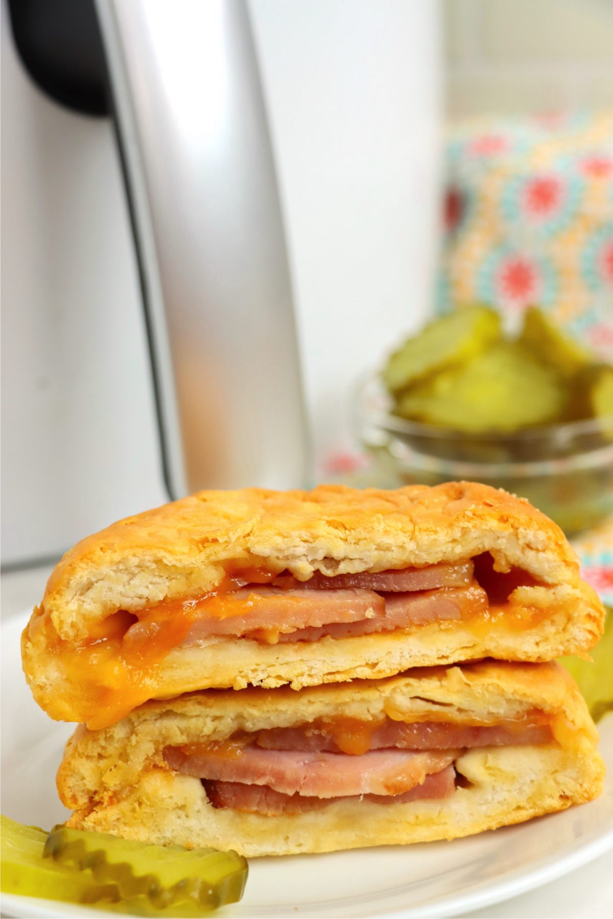 Ham and cheese hot pocket in front of air fryer
