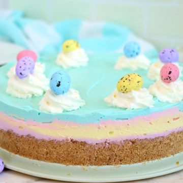 Pastel-layered cheesecake with mini chocolate Easter eggs