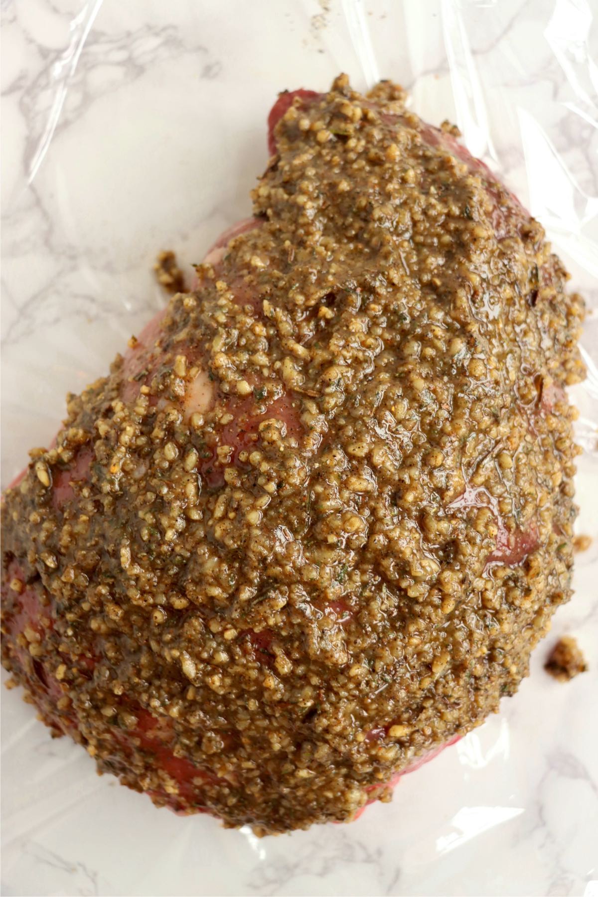 sirloin tip roast covered with olive oil and a spice rub