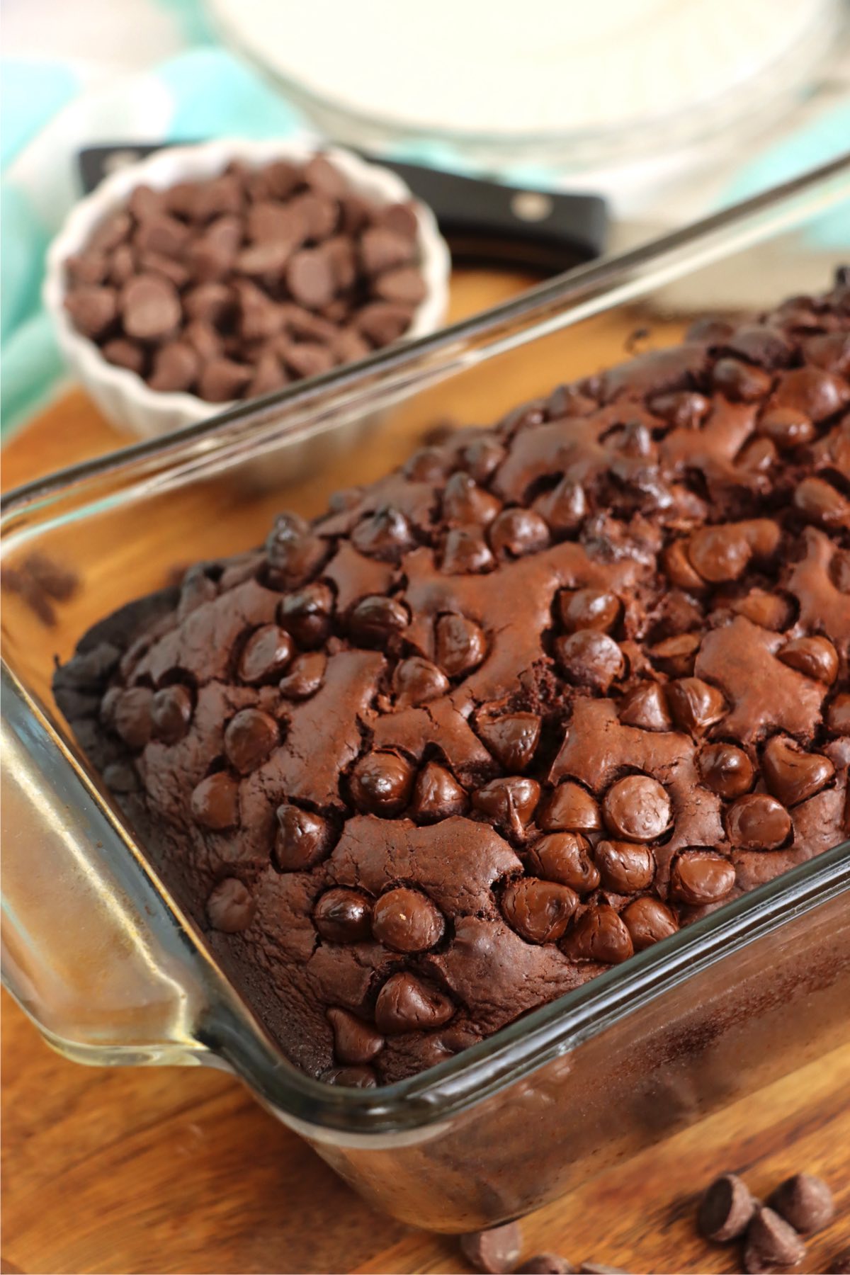 Glass baking pan filled with chocolate chip brownie bread