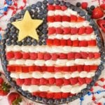 Round fruit pizza made to resemble the American flag