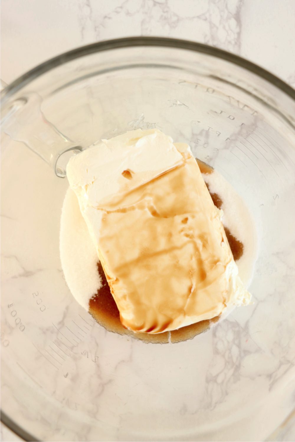 Cream cheese, vanilla and sugar in a mixing bowl