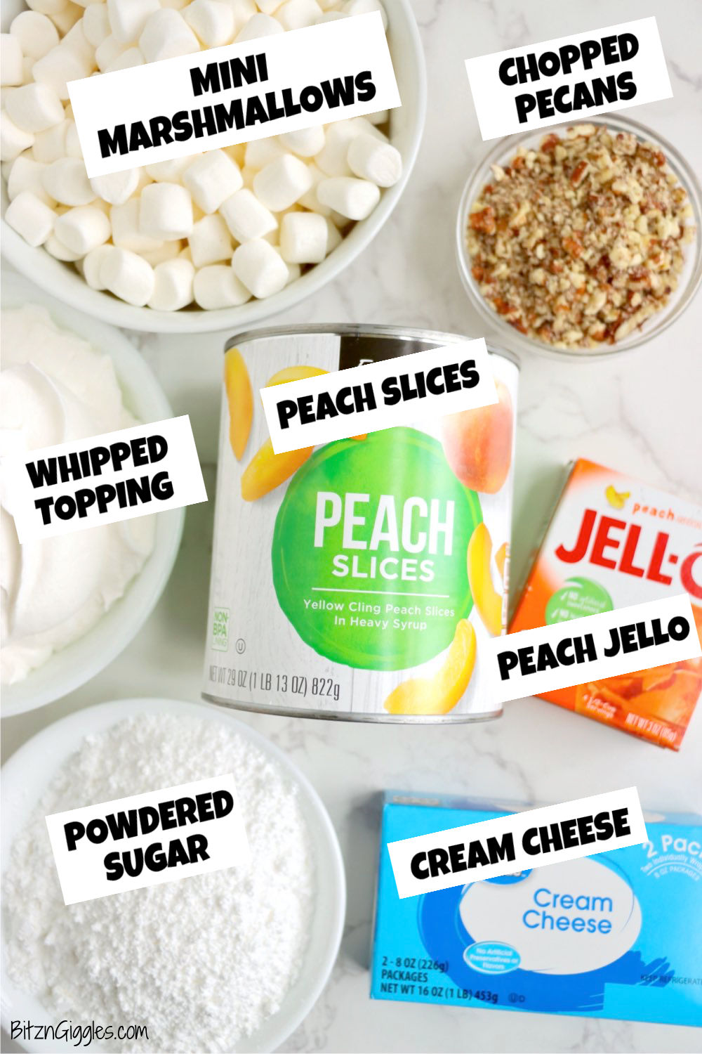 ingredients for a peach jello salad on a marble surface.