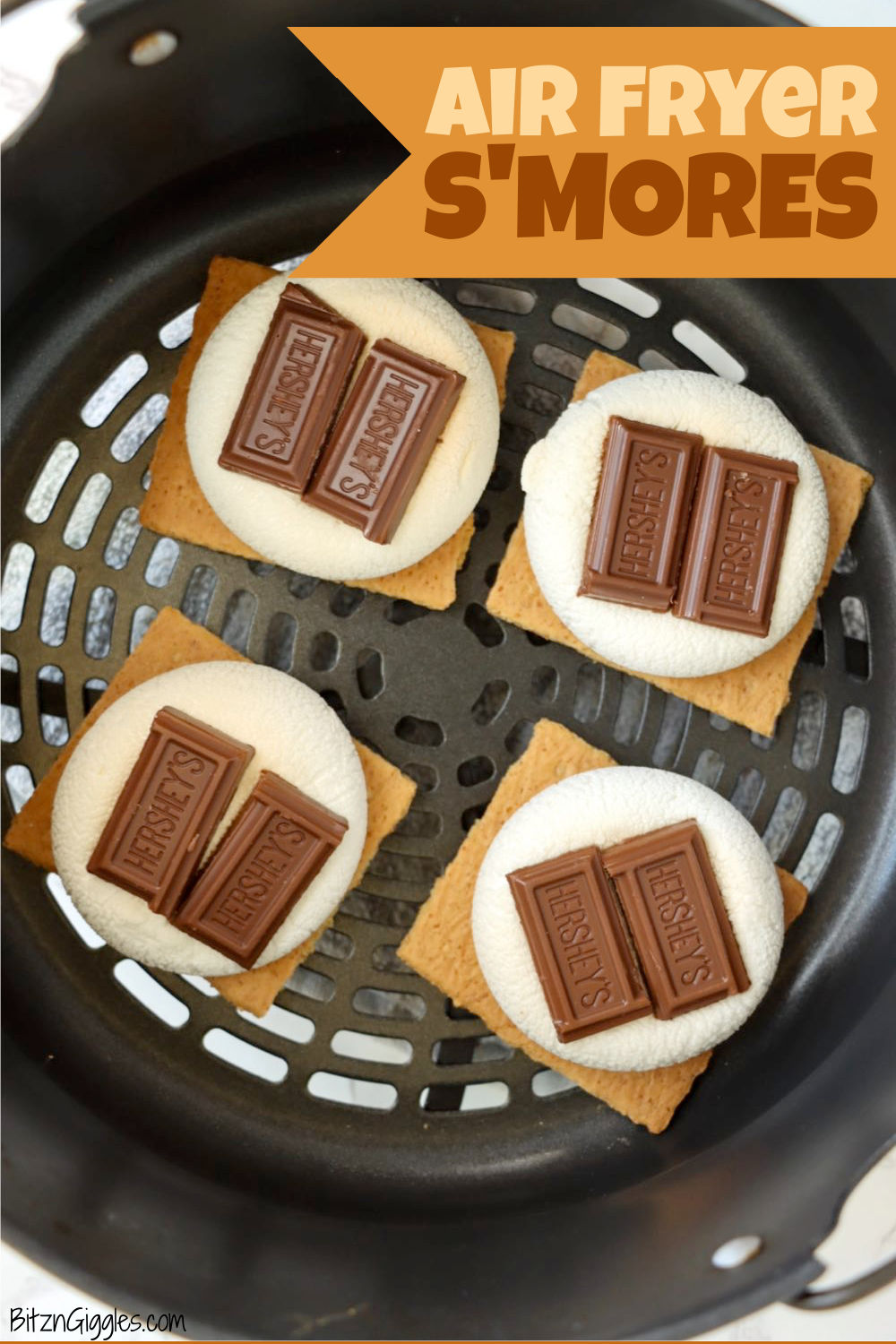 Open faced s'mores in an air fryer basket.