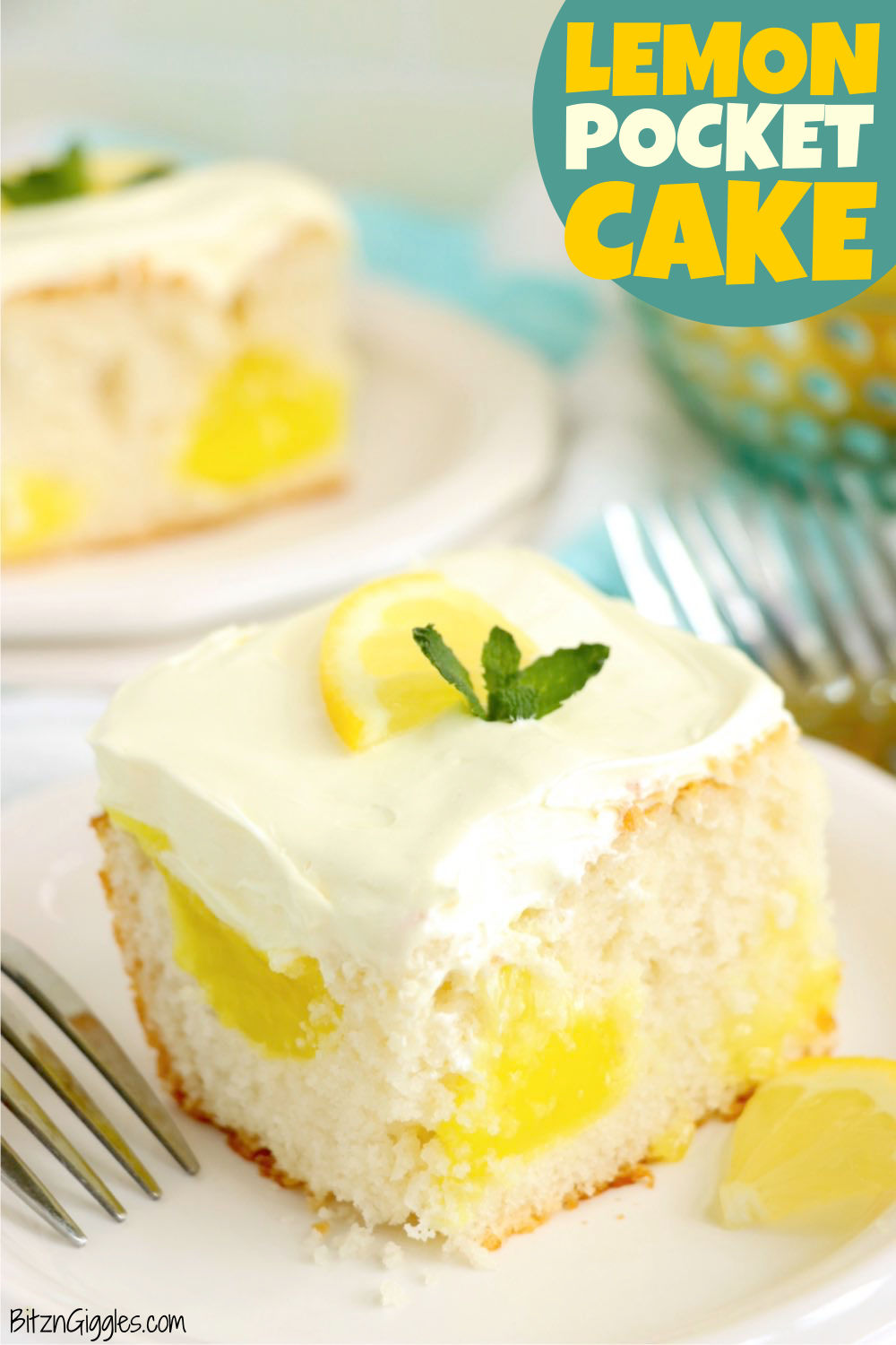 Piece of frosted white cake with pockets of lemon pie filling.