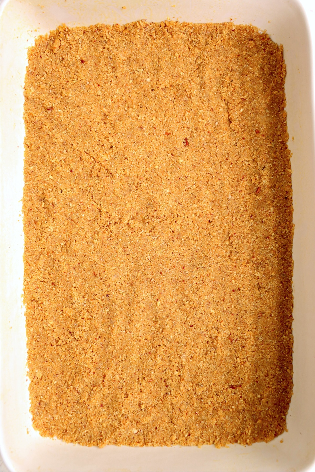 Graham cracker crust pressed into a 13x9-inch pan.