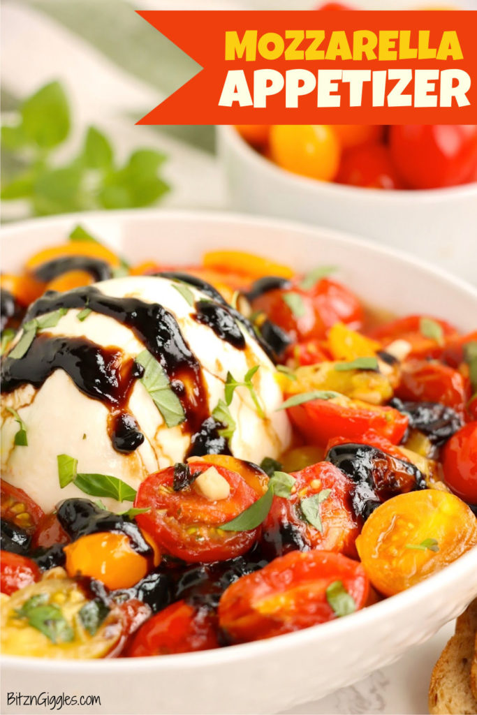 A white bowl filled with balsamic-glazed mozzarella cheese and cherry tomatoes.