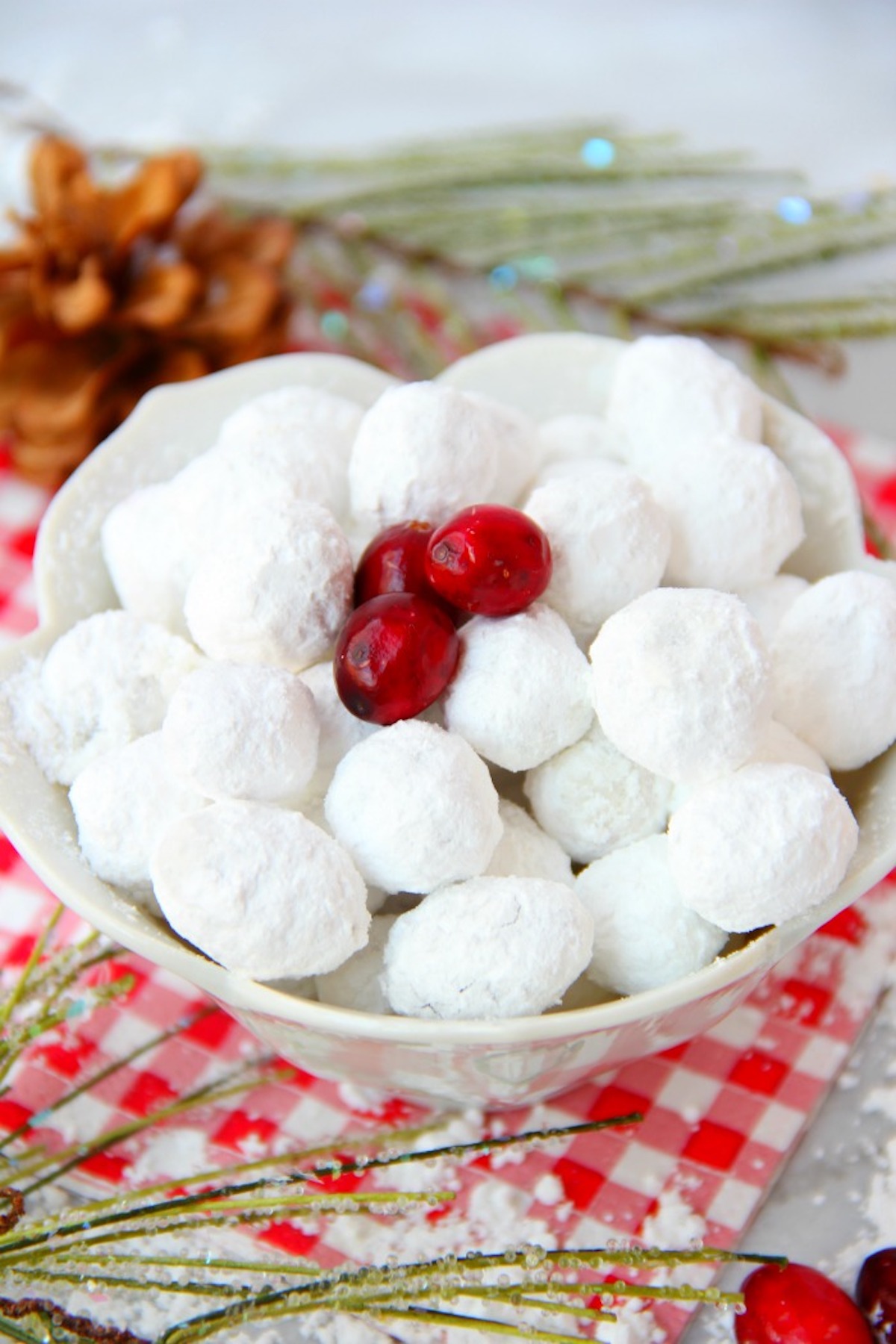 Cranberry snowballs in white bowl.