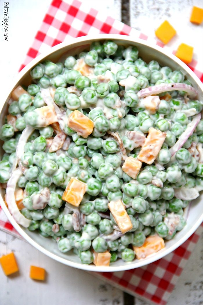 Easy pea salad in white serving bowl.