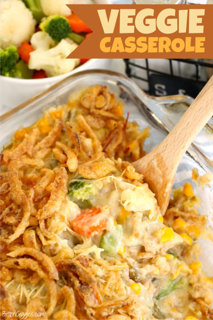 Serving spoon scooping up a serving of Thanksgiving vegetable casserole.