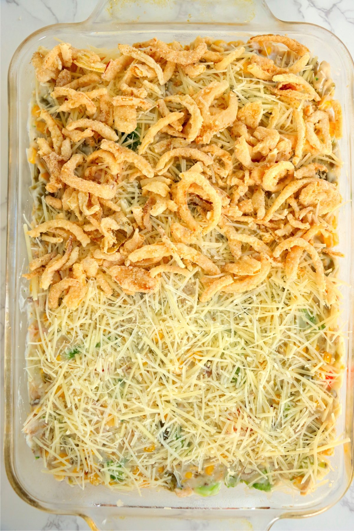 Veggie casserole sprinkled with with crispy fried onions.