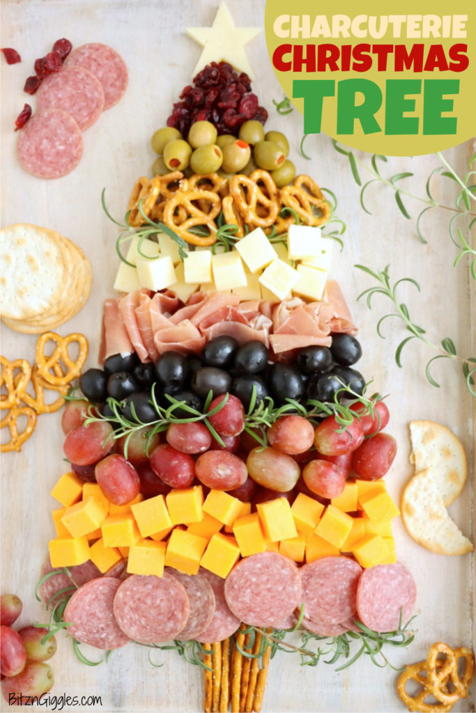 A stunning charcuterie Christmas tree filled with meats, cheeses, and pretzels for holiday celebrations.