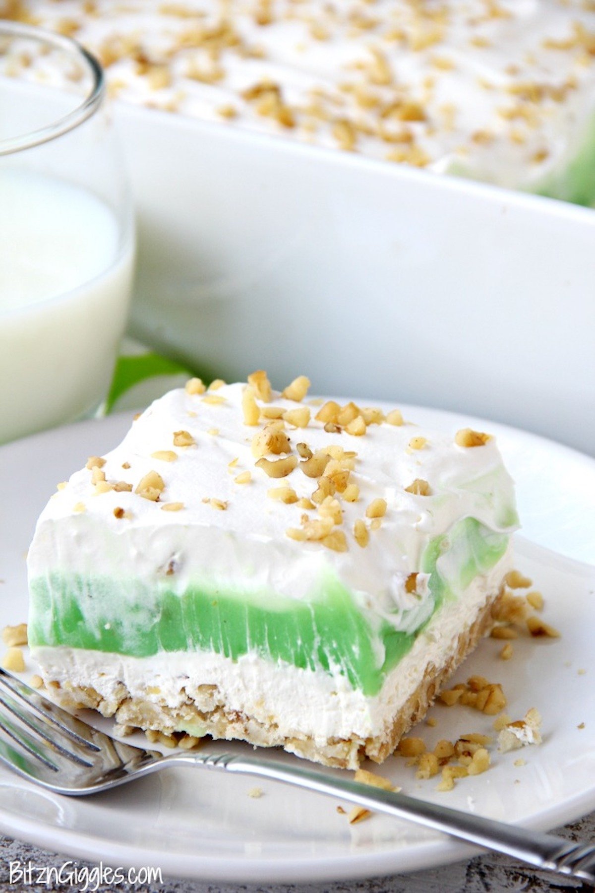 Pistachio Pie Bar on plate with fork.