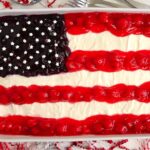 Cheesecake in a baking dish with a flag design.