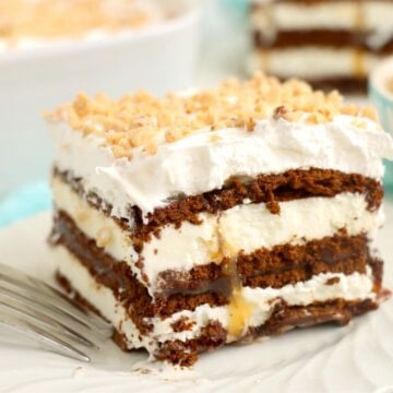 A single plated slice of the ice cream sandwich dessert with a fork nearby.