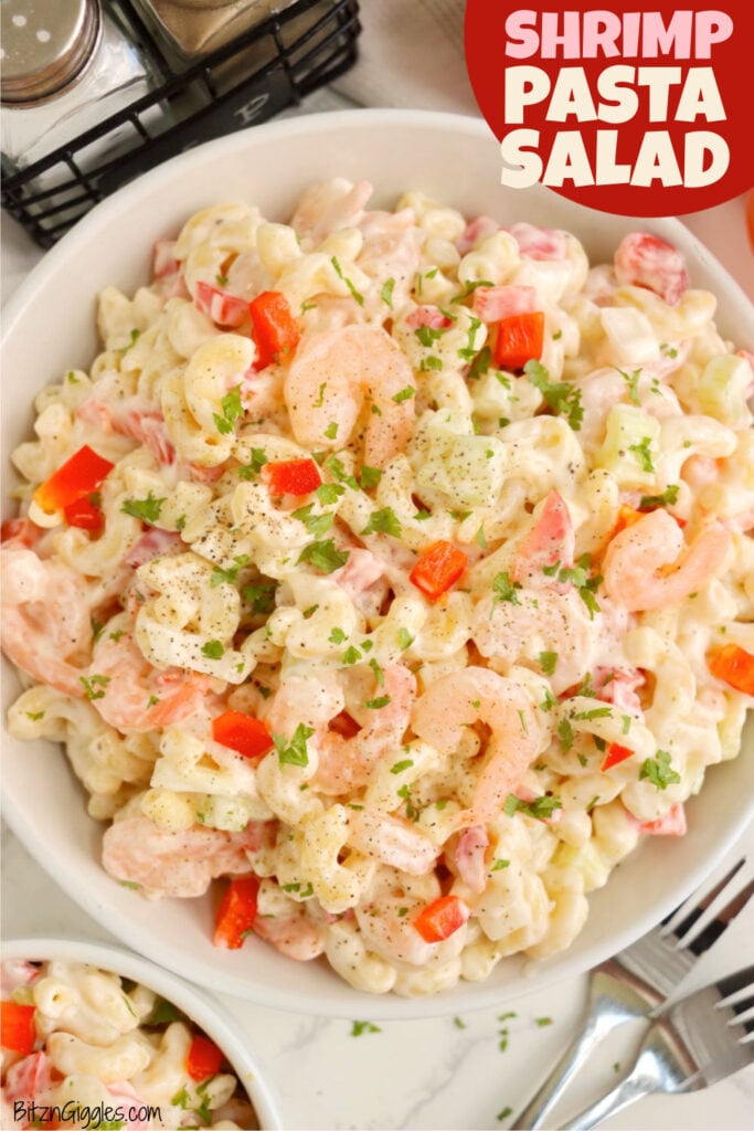 Bowl of creamy shrimp pasta salad with shrimp and peppers.