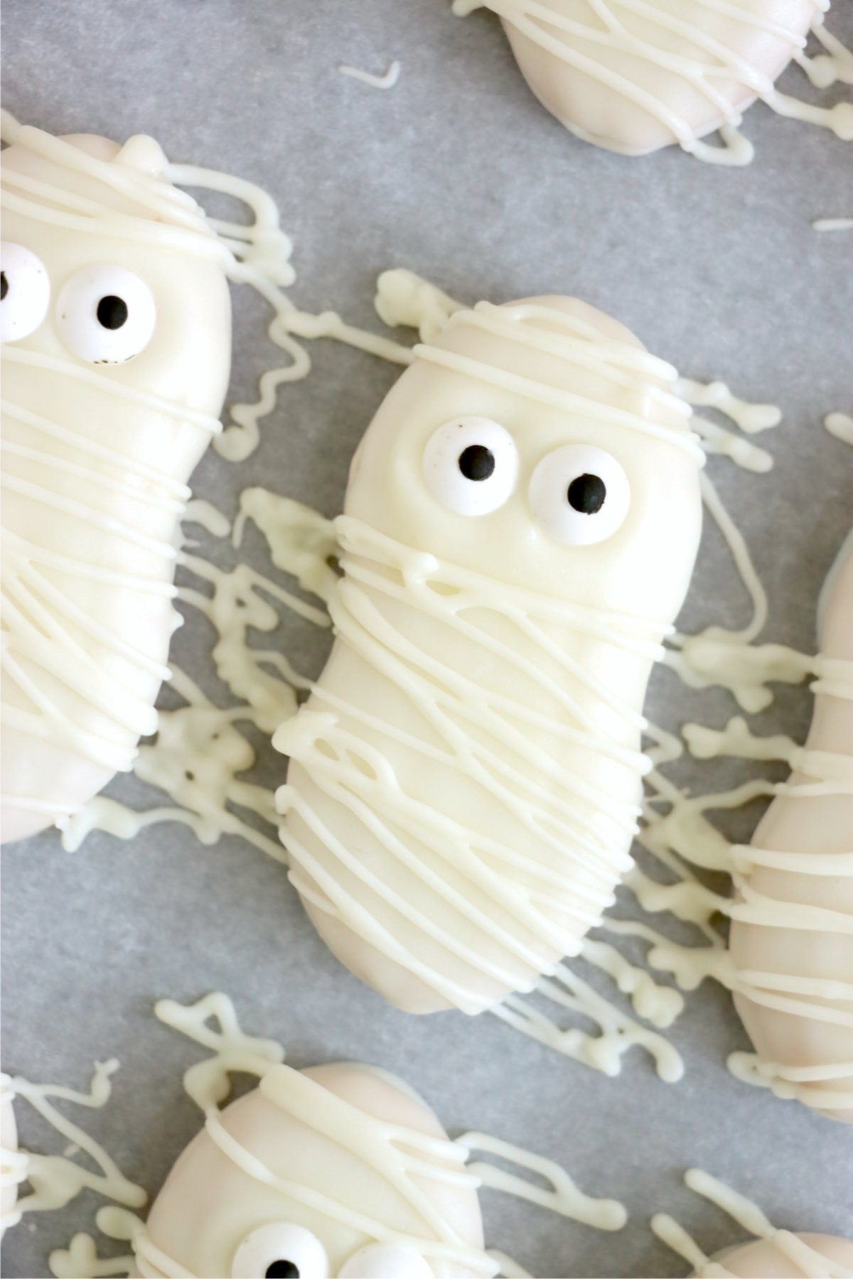 Finished mummy cookies drizzled with white chocolate
