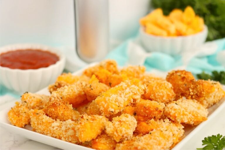 Air fryer cheese curds arranged on a serving platter.