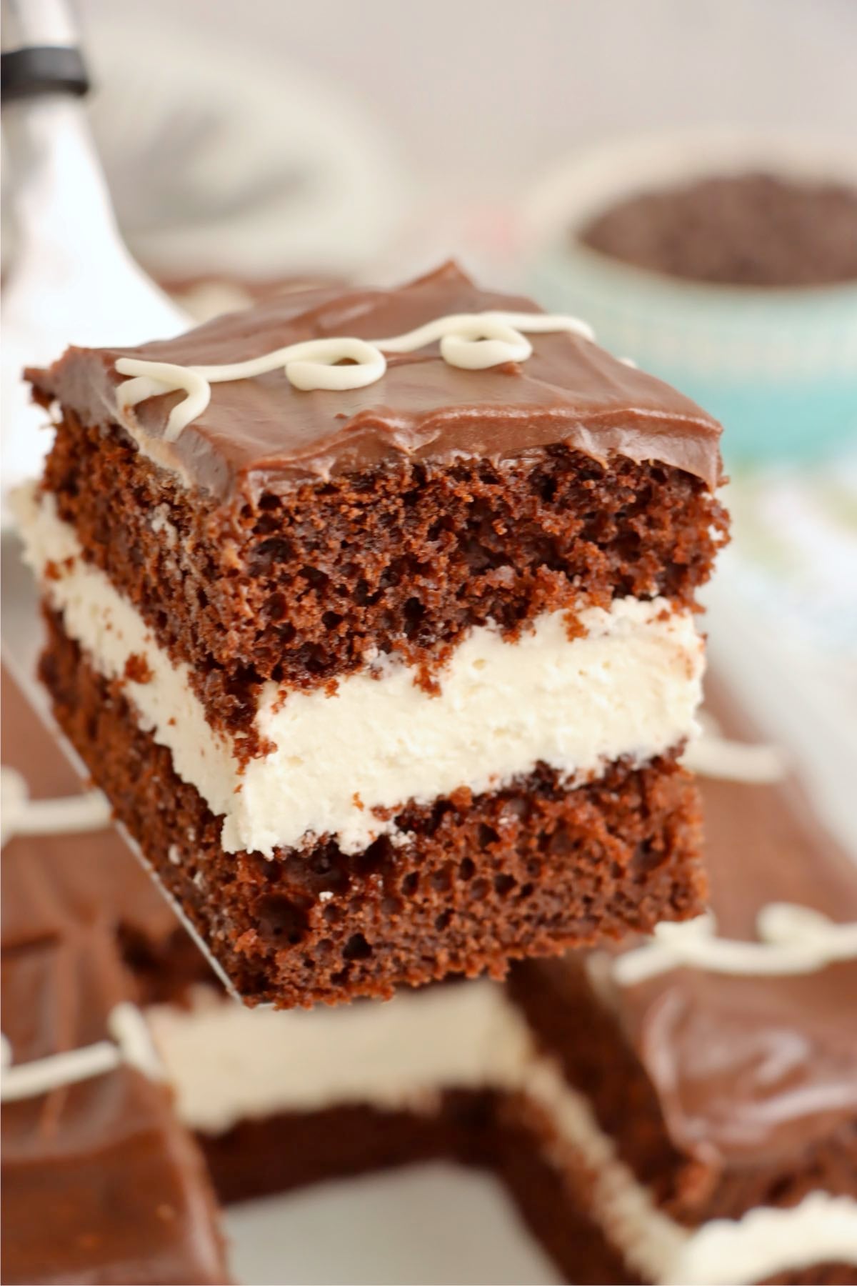 Single slice of Hostess sheet cake served on a white plate.