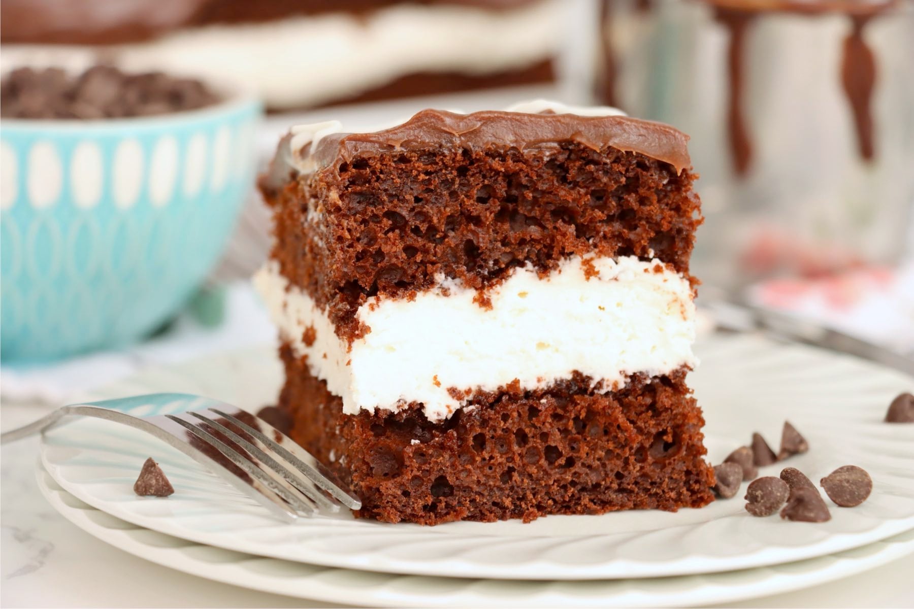 A thick slice of Hostess-style chocolate sheet cake.