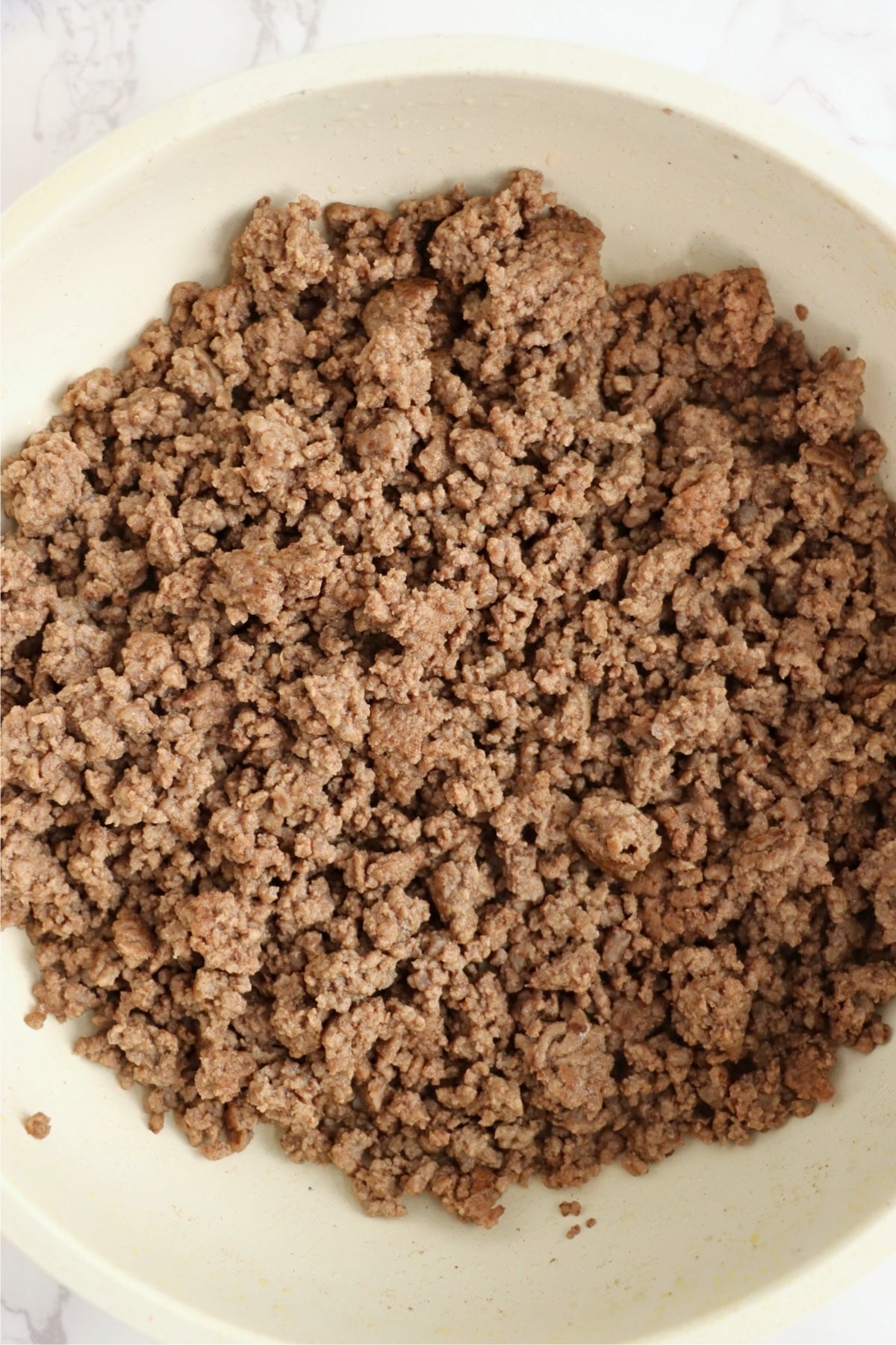 Fully browned ground beef cooked and ready to use.