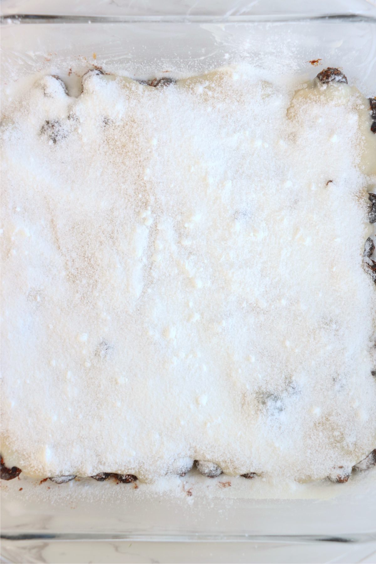 Sugar and cornstarch mixture sprinkled evenly over the cake batter.