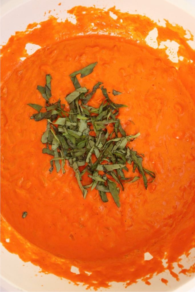 Creamy tomato vodka sauce stirred with fresh chopped basil.