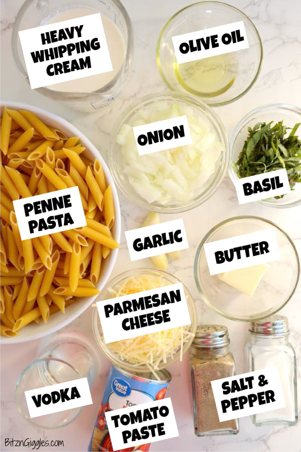 Ingredients for penne alla vodka including pasta, cream, tomato paste, vodka, and basil.