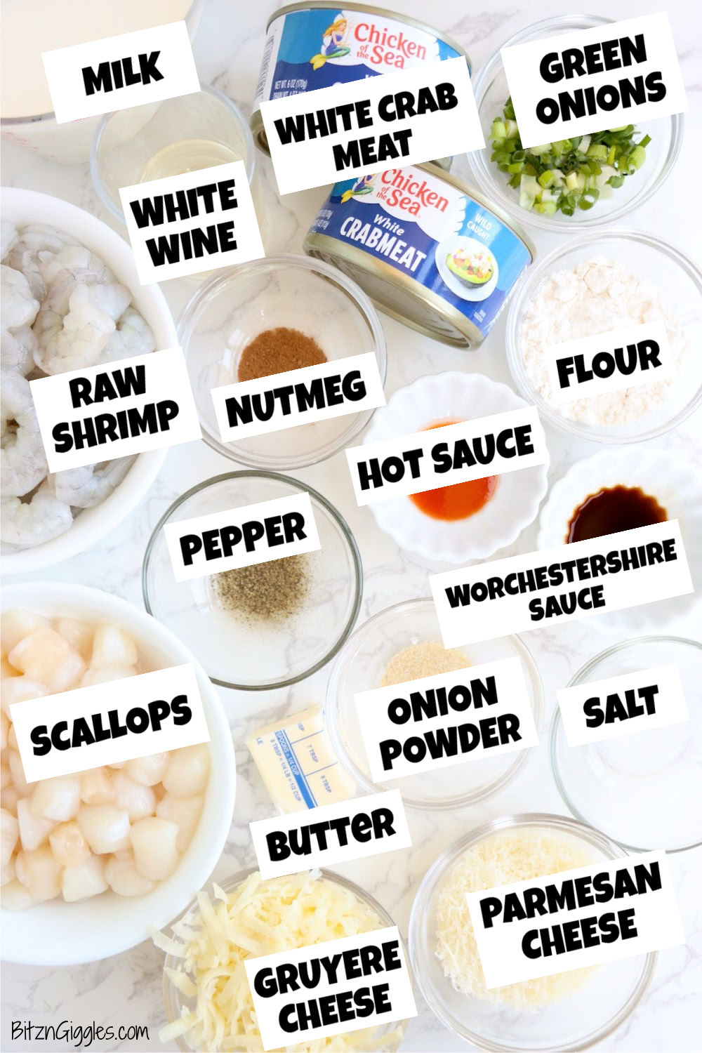 Ingredients for Coquilles St. Jacques including shrimp, scallops, crab meat, milk, Gruyere, Parmesan, butter, flour, wine, and seasonings.