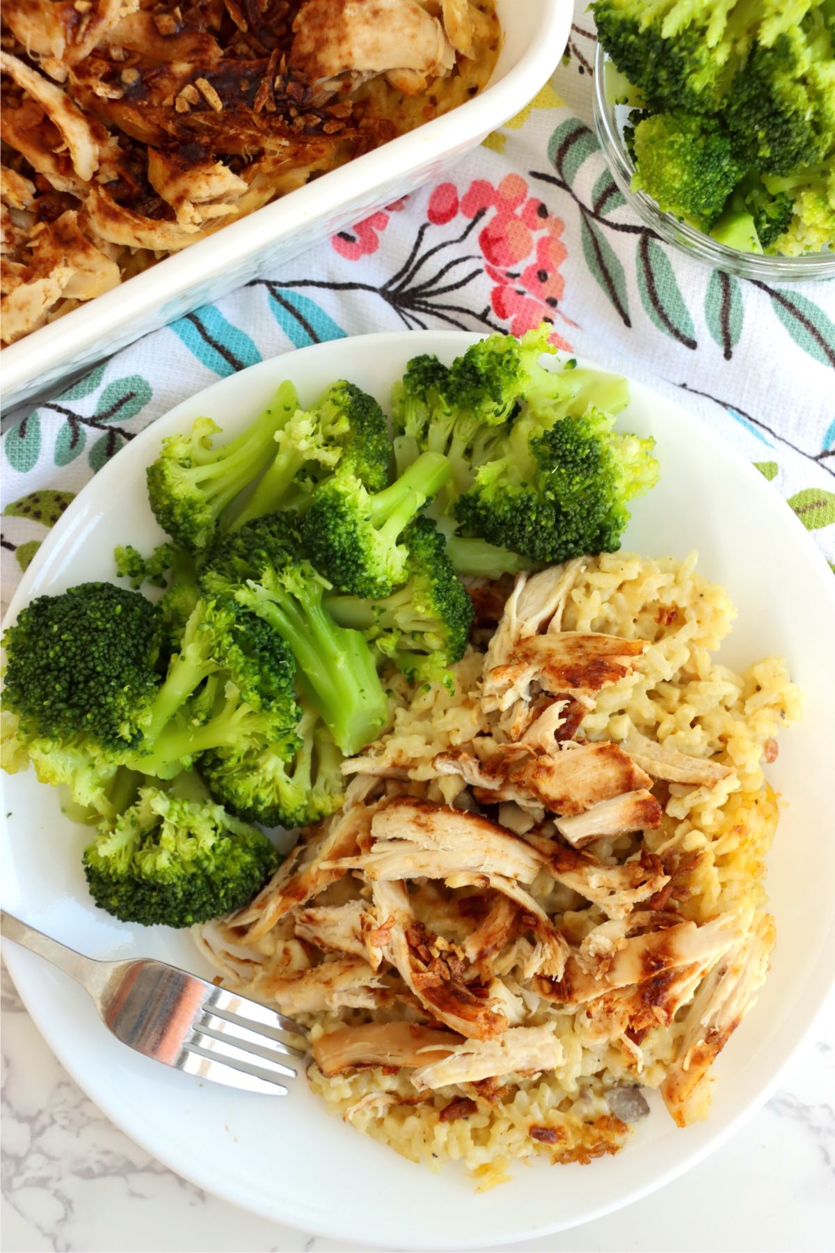 Creamy chicken and rice topped with browned chicken pieces and crispy onion bits.