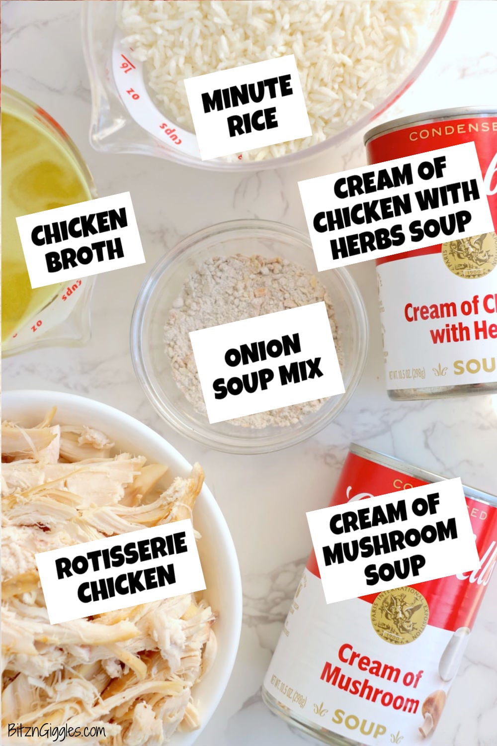 Ingredients on a white table including rotisserie chicken, rice, cream soups, chicken broth, and dry onion soup mix.