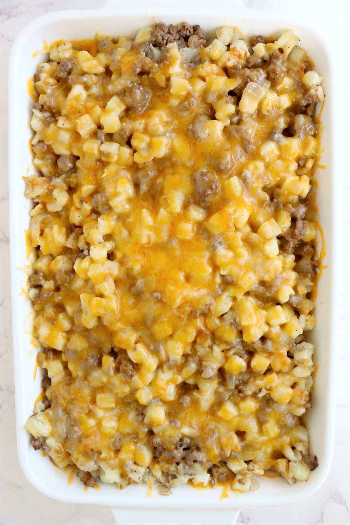 Baked casserole with melted cheese on top.