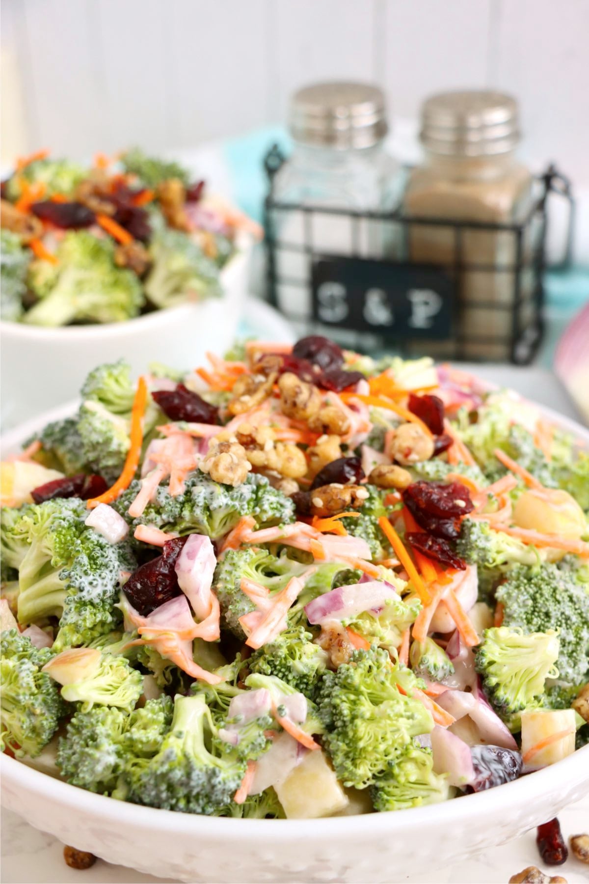 Broccoli crunch salad with broccoli, cranberries, and walnuts.